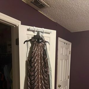 Elegant black dress with rose gold sequins.